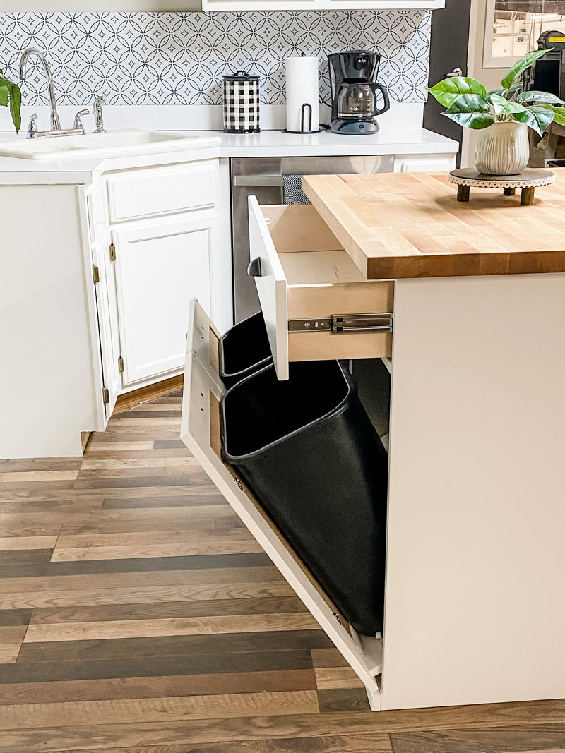 Island in white with a butcher block top