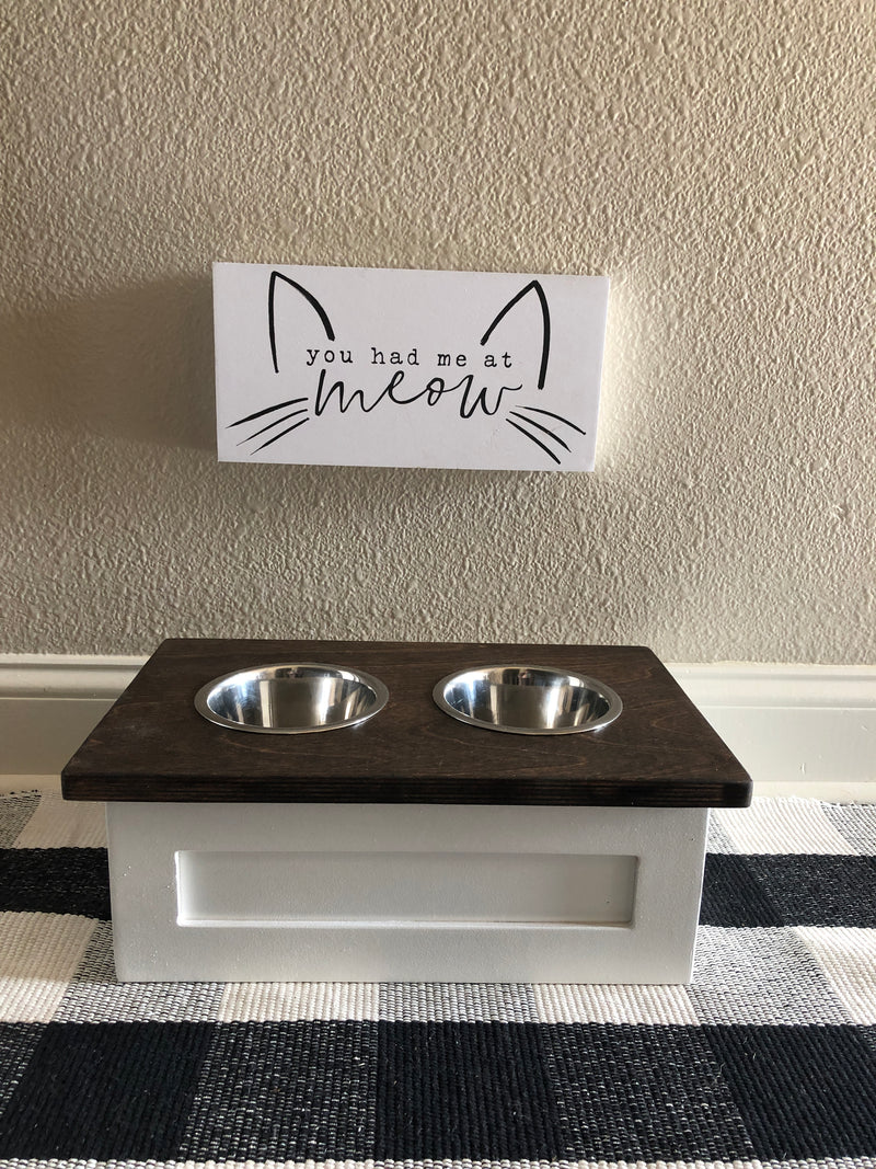 Two bowl small size elevated pet feeder in white with an dark brown stain top and a FL front (W-dk brwn top | 2 bowl)