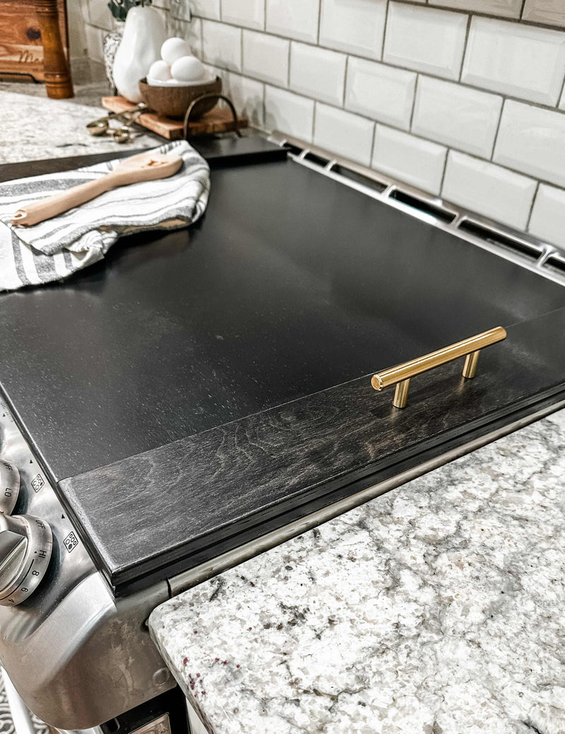 Clean and simple minimalist black stove cover