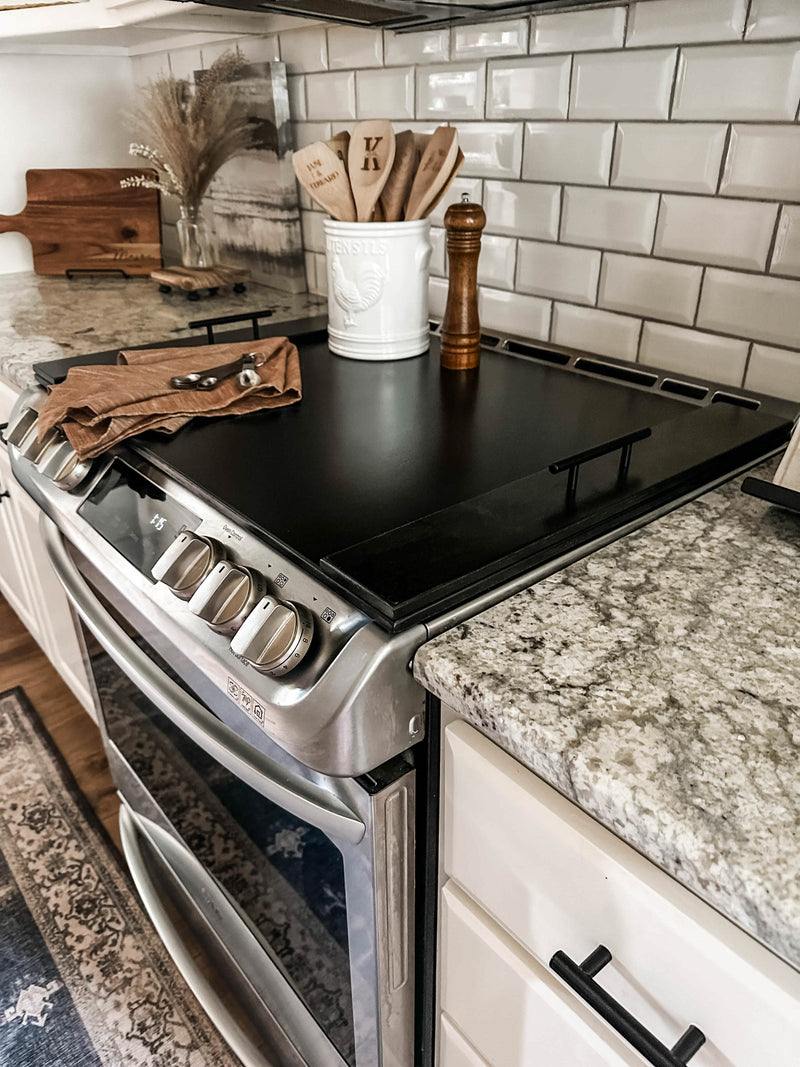 Clean and simple minimalist black stove cover