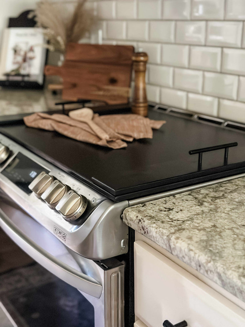 Clean and simple minimalist black stove cover