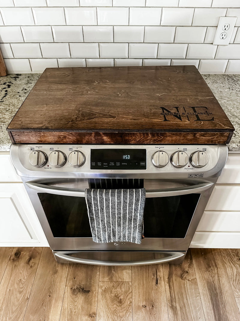Initials monogram stove cover in warm brown