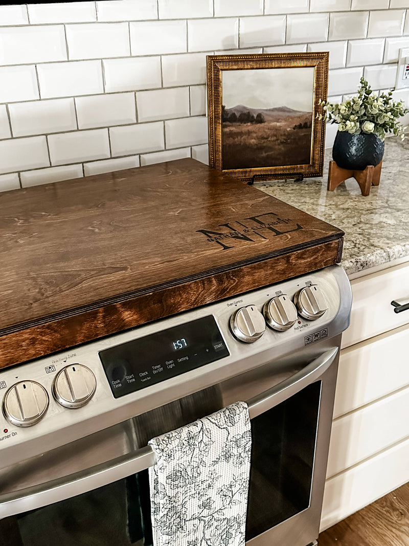 Initials monogram stove cover in warm brown