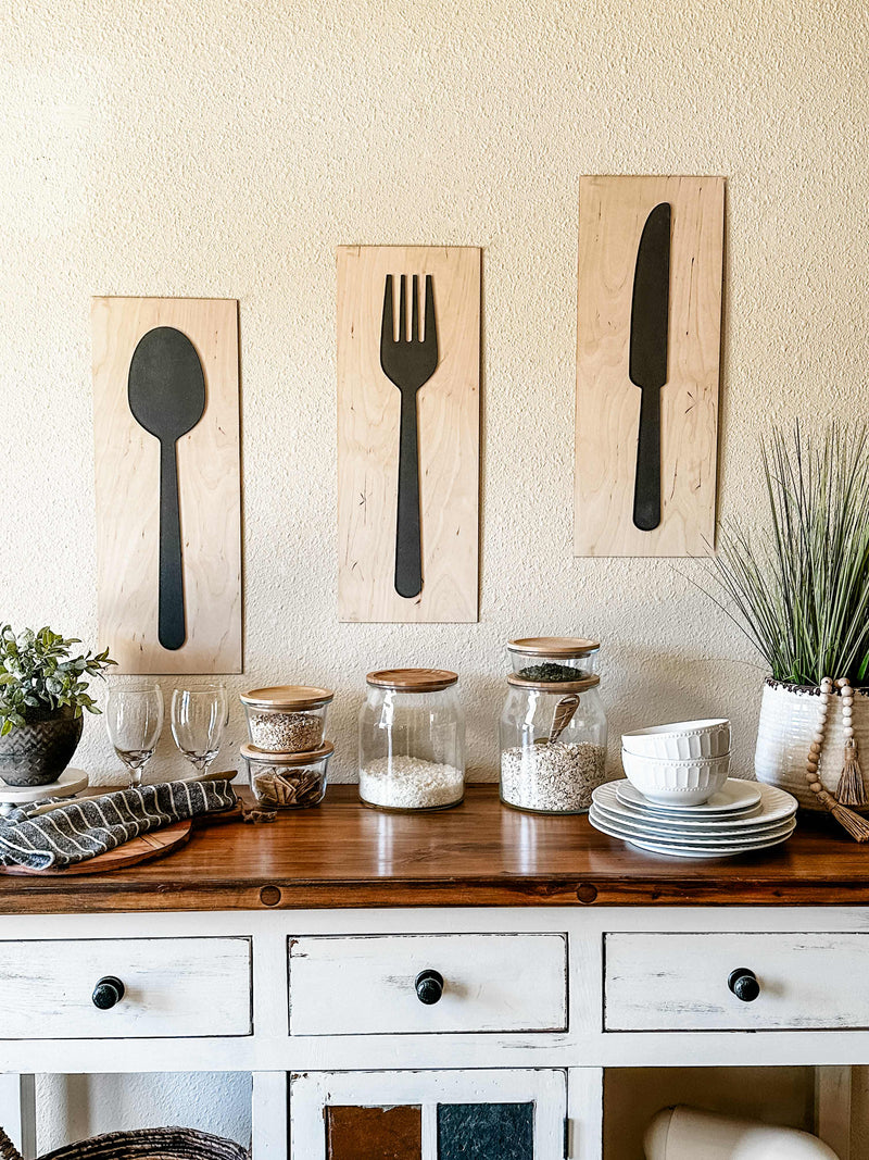 Fork, spoon, and knife set handmade of wood wall decor in dark charcoal with natural wood layered