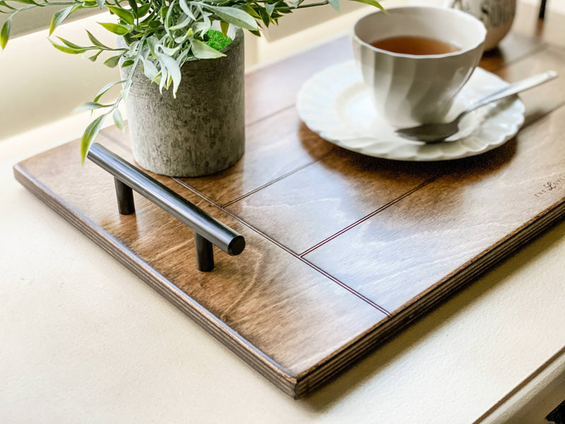 warm brown serving tray with breadboard motif