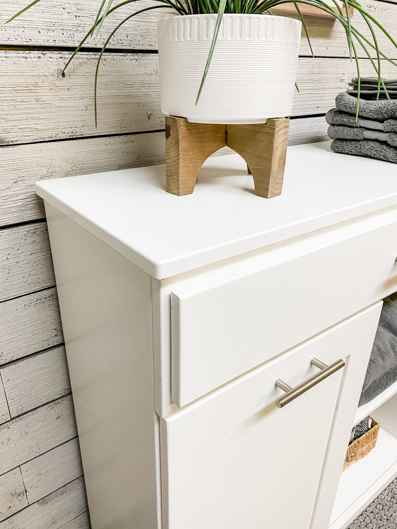 Dashwood laundry with open shelving and drawer in white, farmhouse style doors