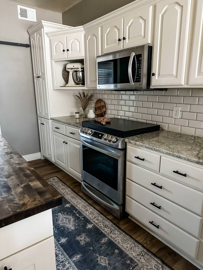 Clean and simple minimalist black stove cover