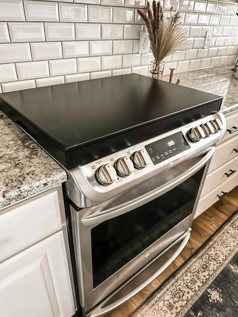 Clean and simple minimalist black stove cover