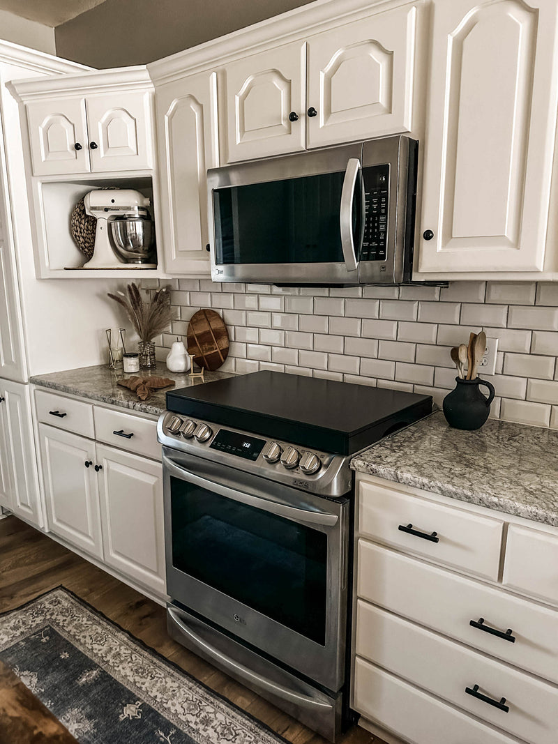 Clean and simple minimalist black stove cover