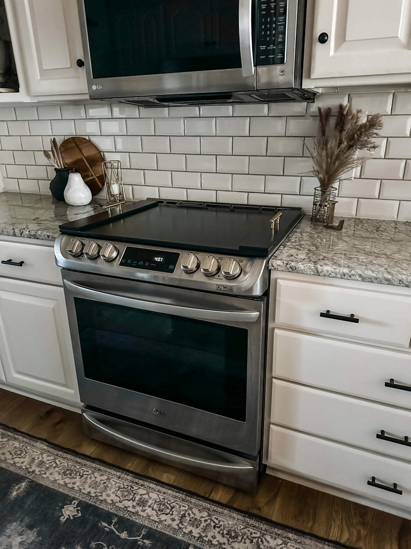 Clean and simple minimalist black stove cover