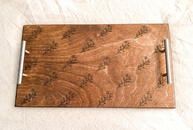 Warm brown serving tray with delicate floral motif