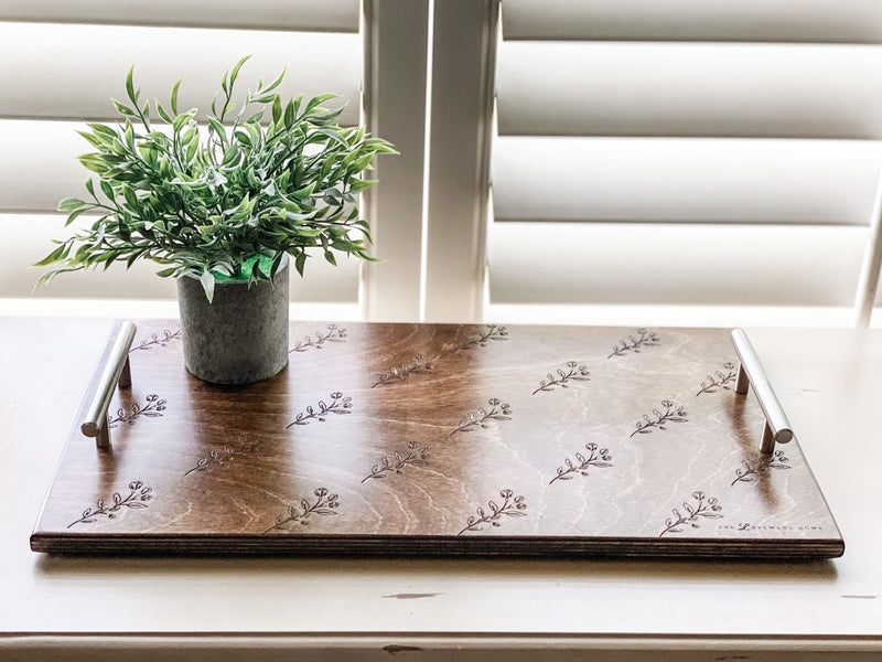 Warm brown serving tray with delicate floral motif