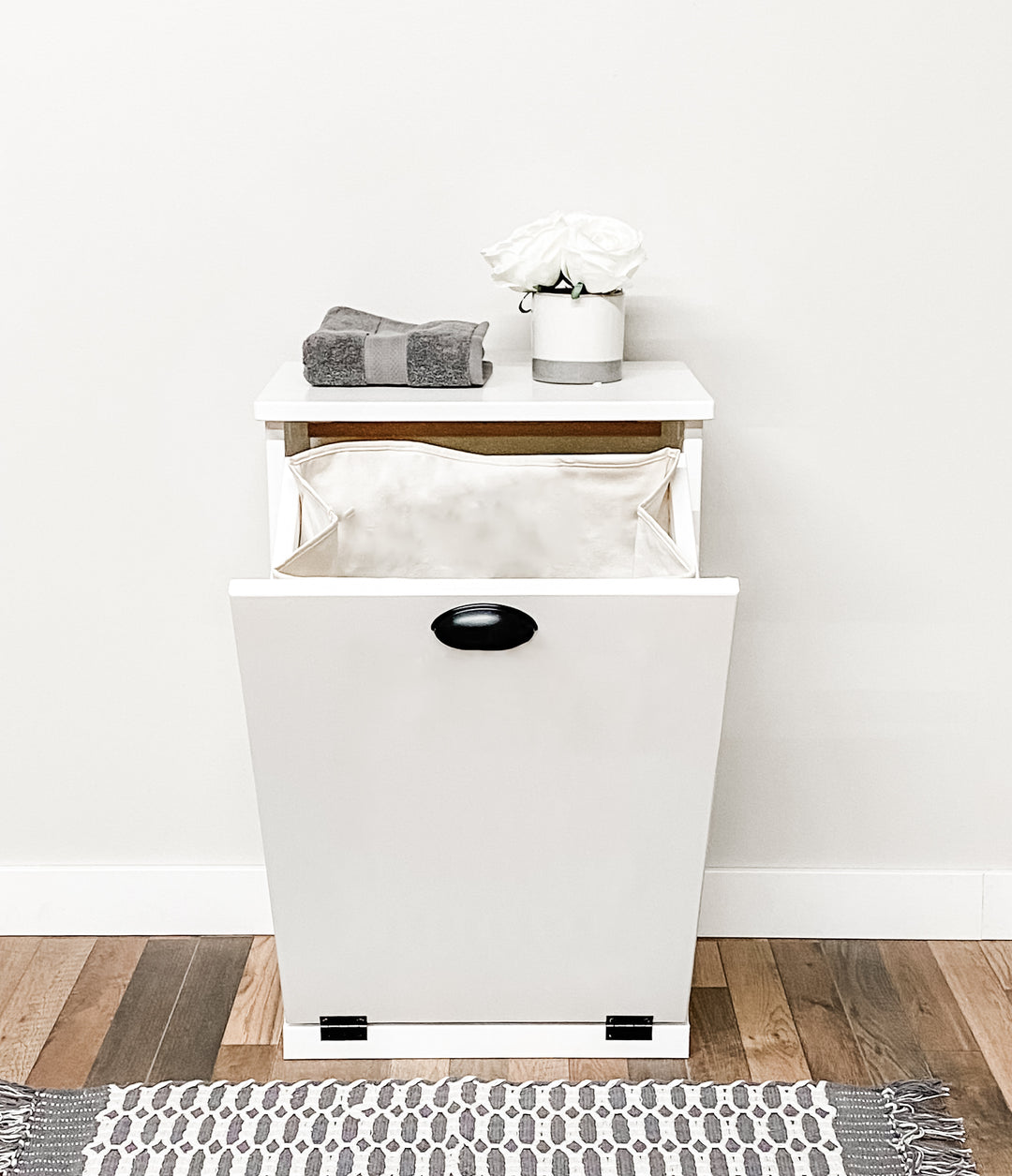 single laundry hamper with removable bag in white with a stained dark brown top and chalkboard door center.