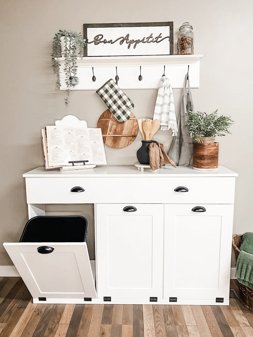 triple cabinet with a drawer