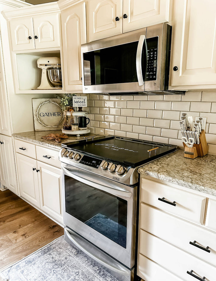 Personalized last name + est. date stove cover, black stain, "Johnson"