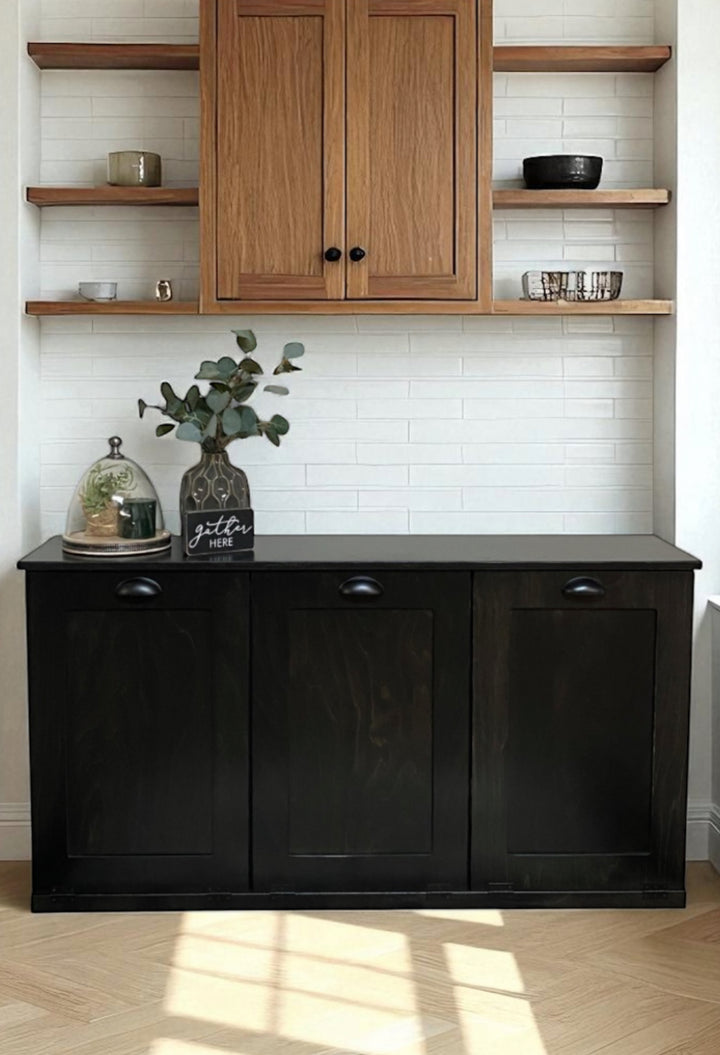 Sleek triple tilt-out trash cabinet in black stain