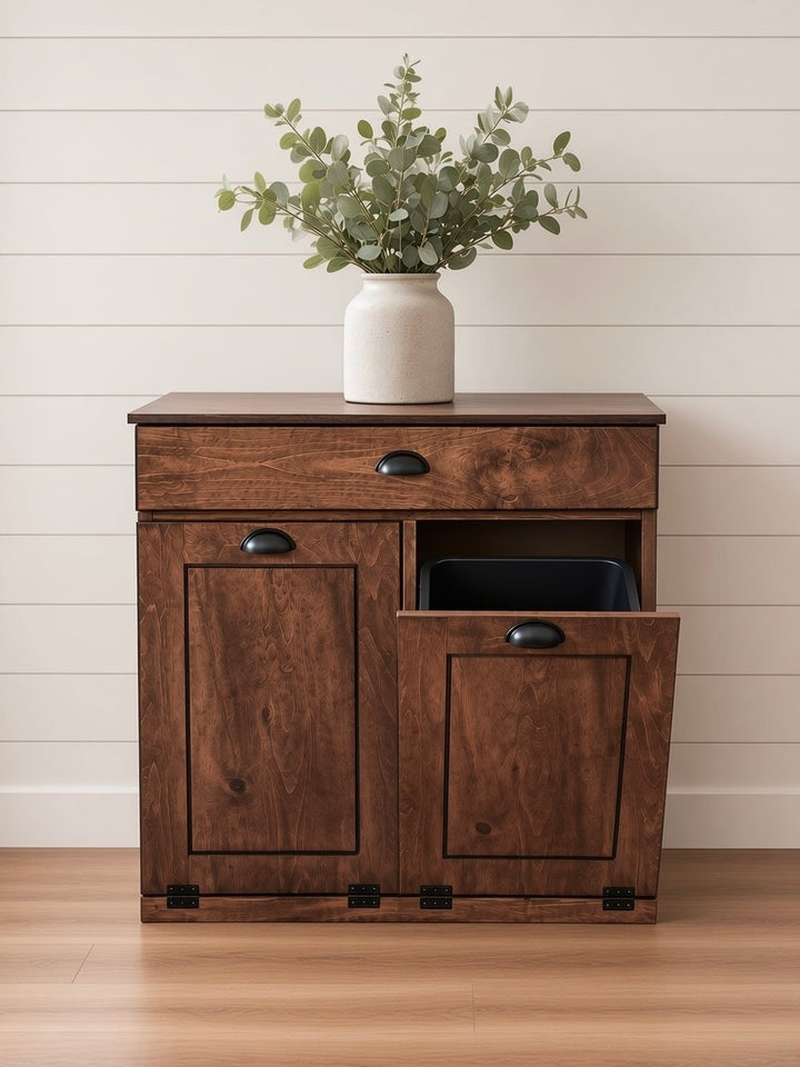 Counter tall hidden trash cabinet with a storage drawer in warm brown