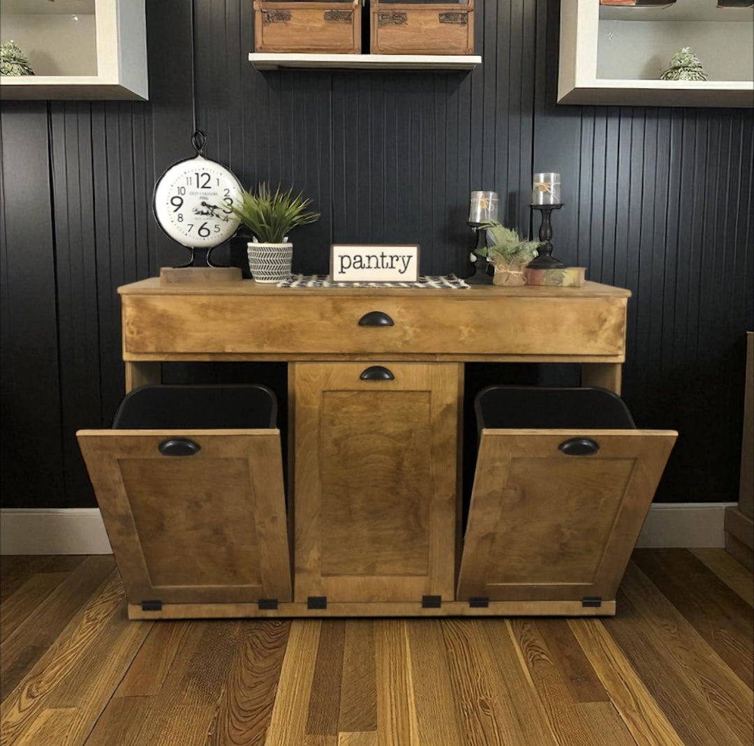 Handmade triple trash cabinet with storage drawer in golden oak stain