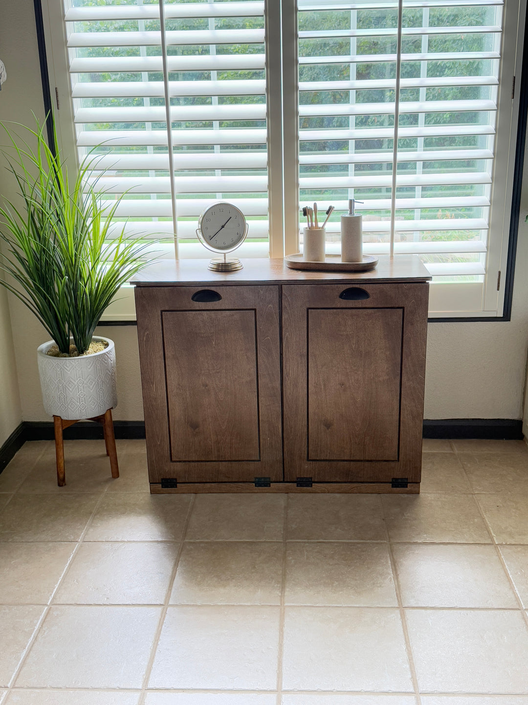 Double tilt out wood laundry hamper in warm brown stain