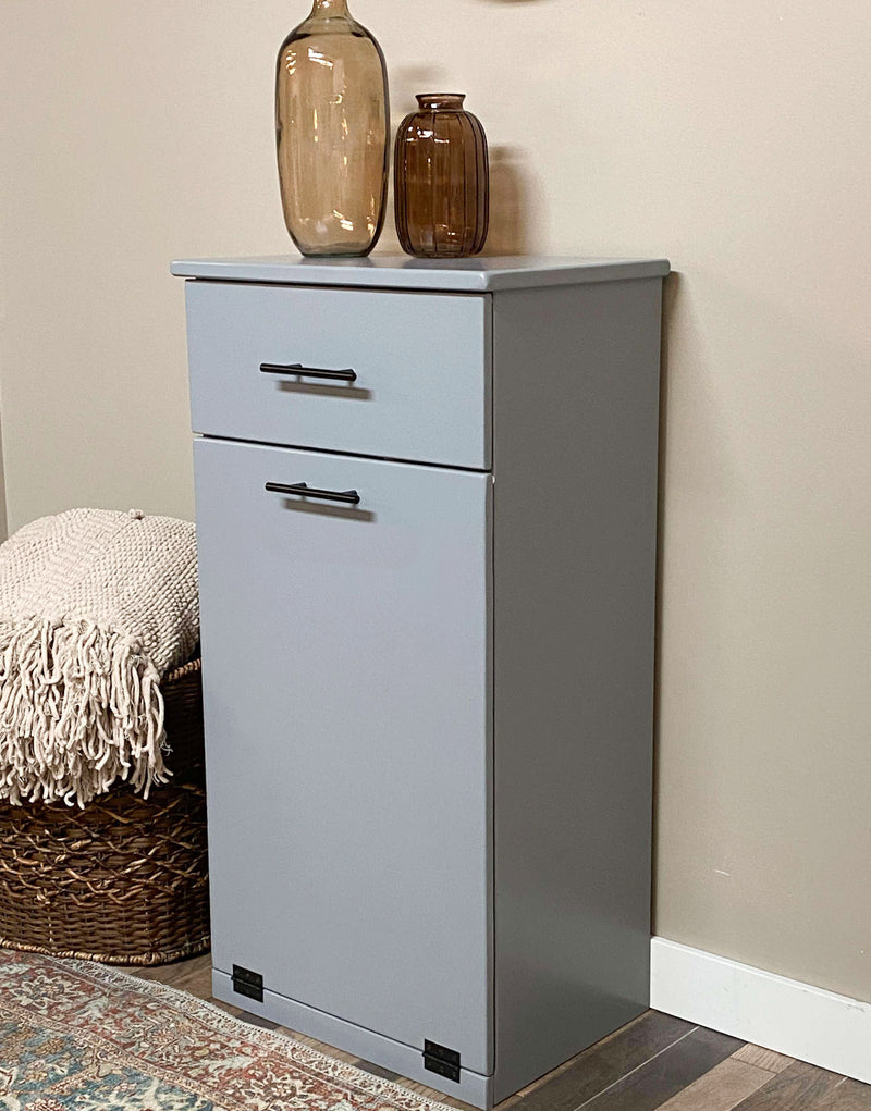 Sinclair with a storage drawer in gray modern door.