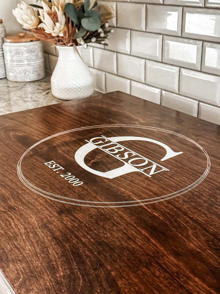 Personalized monogram stove cover, warm brown stain + soft white "Gibson"