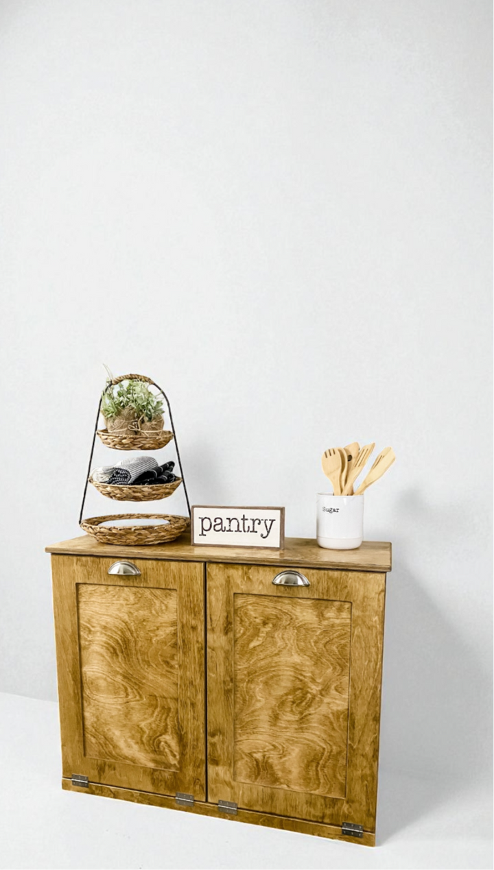 Furniture style double trash cabinet in golden oak