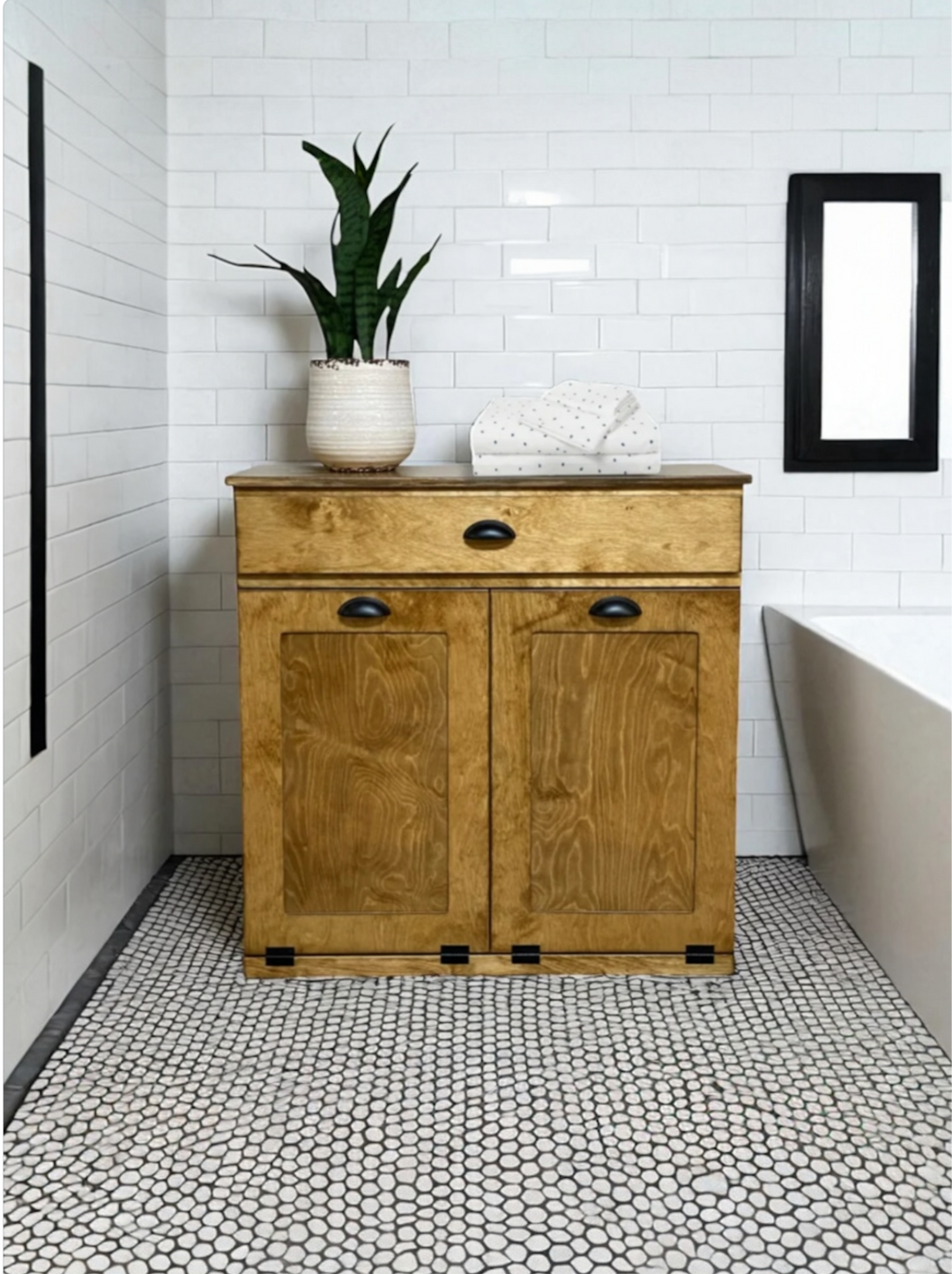 Double laundry with a storage drawer in golden oak counter high