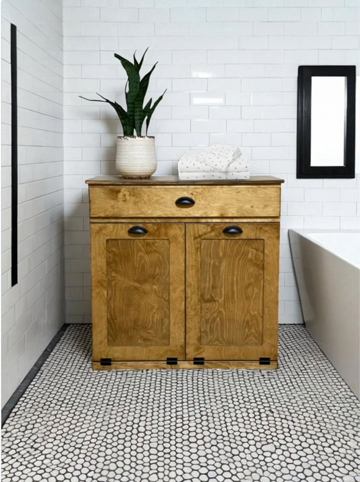 Double laundry with a storage drawer in golden oak counter high