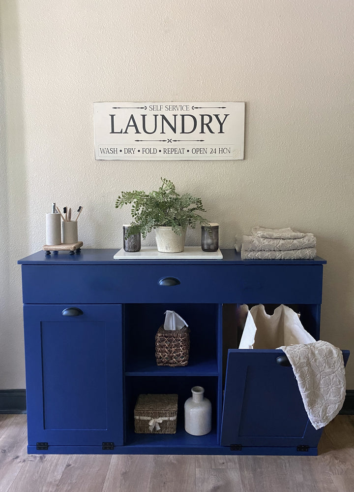 3 bin laundry with a storage drawer and open shelving in blue