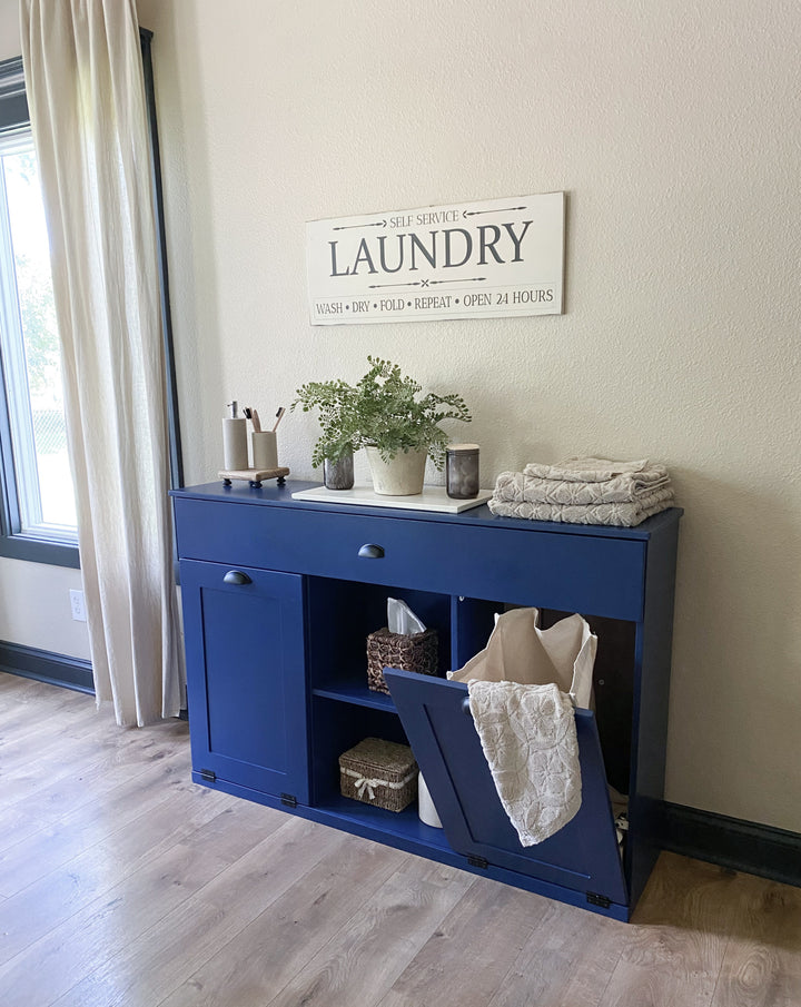 3 bin laundry with a storage drawer and open shelving in blue