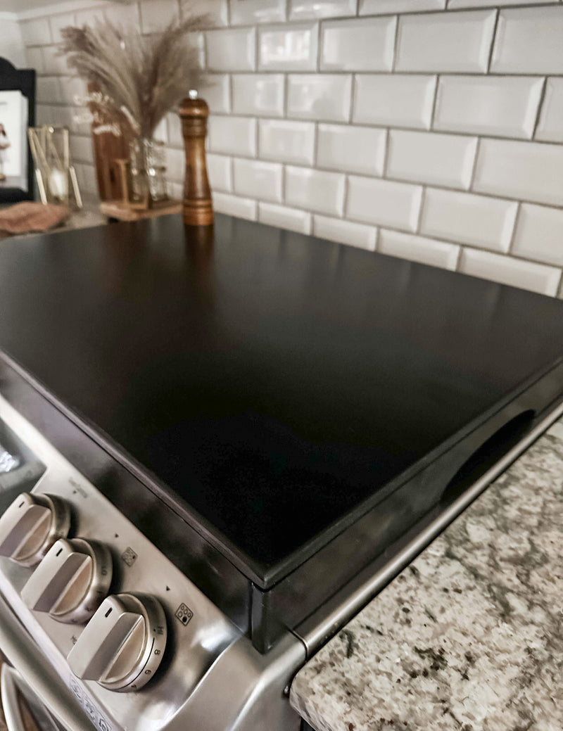 Clean and simple minimalist black stove cover