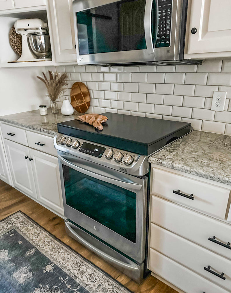 Clean and simple minimalist black stove cover