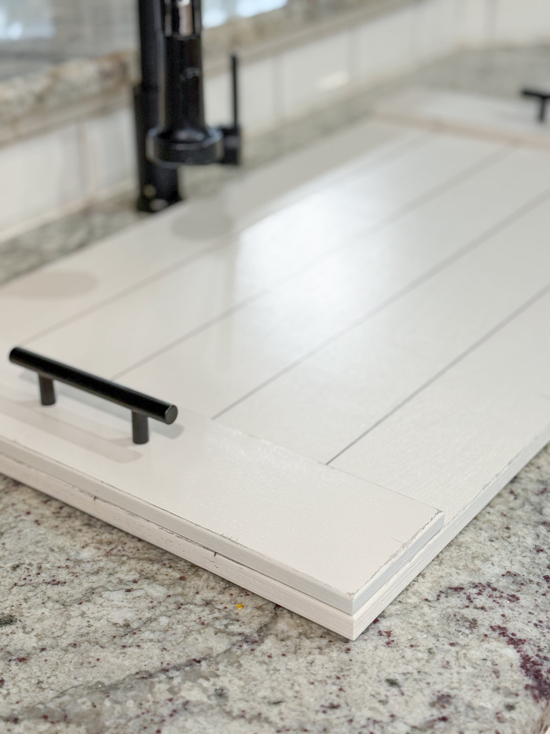 Distressed slatted sink cover in white