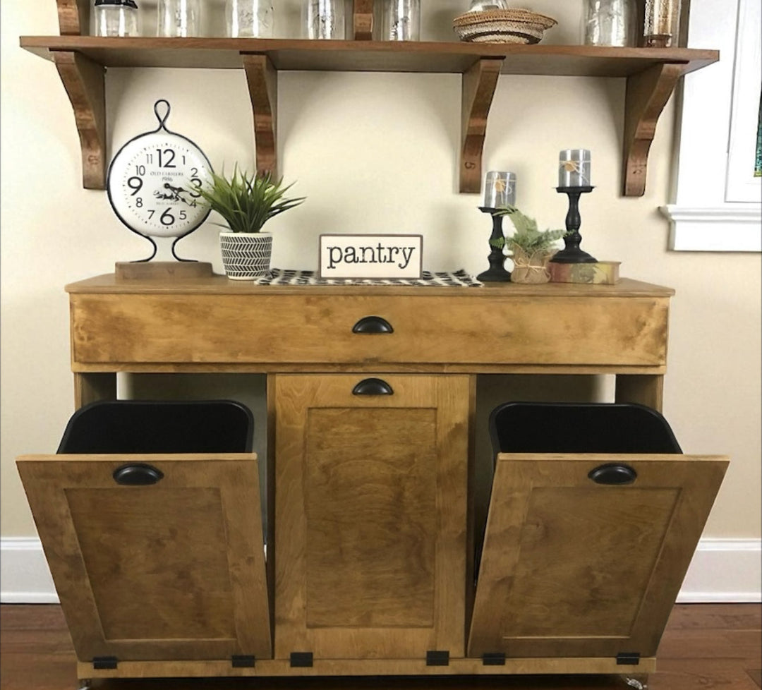 Handmade triple trash cabinet with storage drawer in golden oak stain