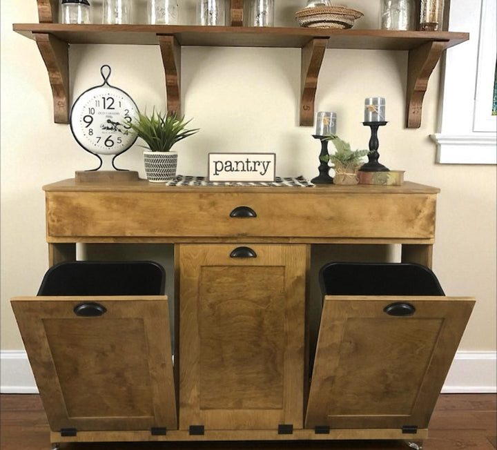 Handmade triple trash cabinet with storage drawer in golden oak stain