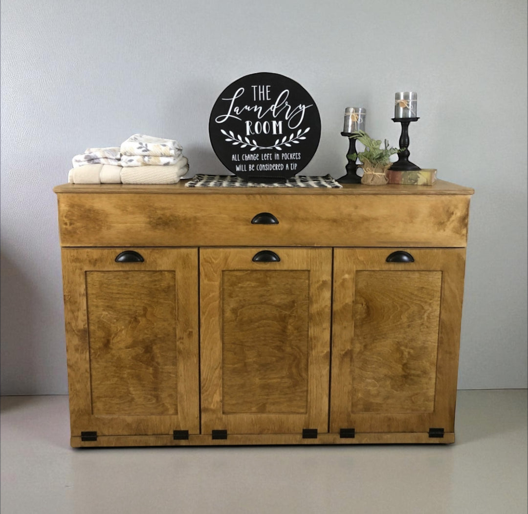Triple laundry with a storage drawer in golden oak stain