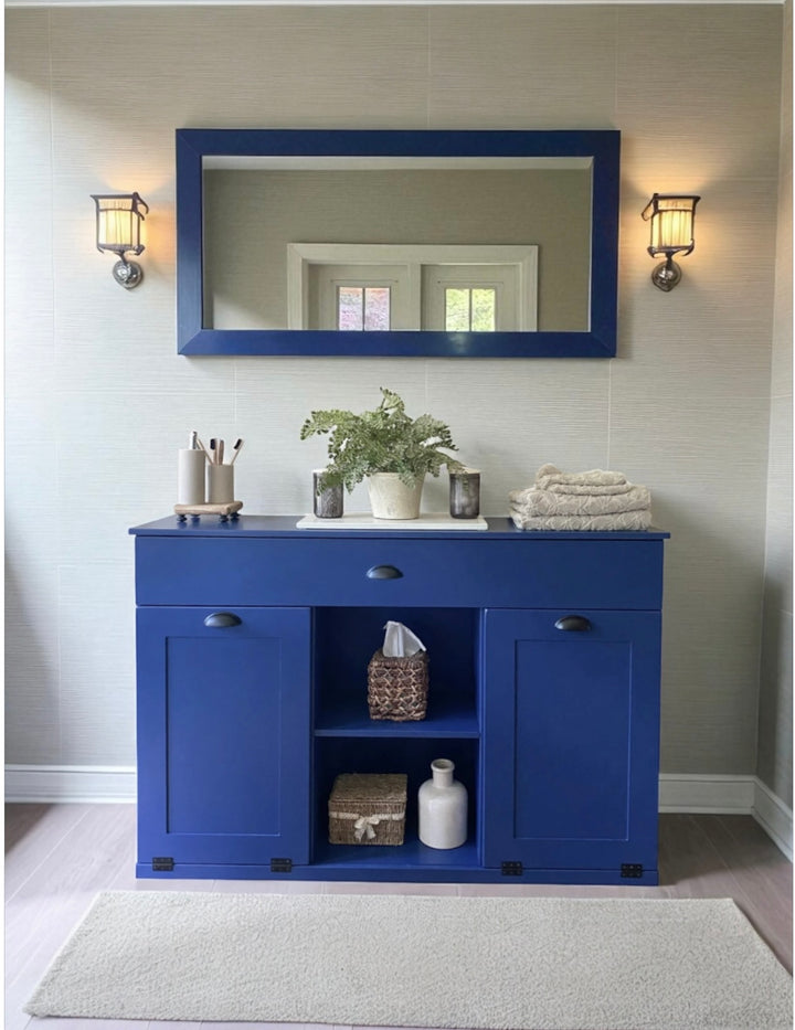 3 bin laundry with a storage drawer and open shelving in blue