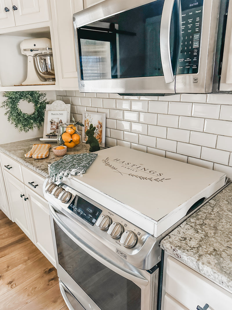 Personalized last name stove cover, ivory distressed, Hastings