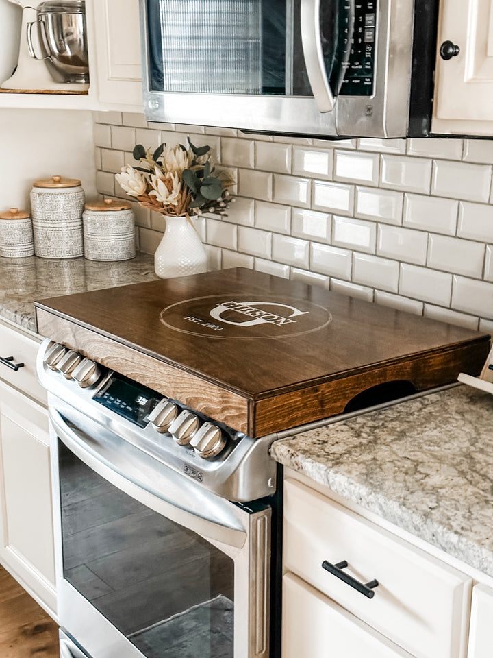 Personalized monogram stove cover, warm brown stain + soft white "Gibson"