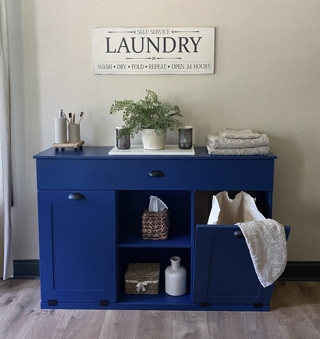 3 bin laundry with a storage drawer and open shelving in blue
