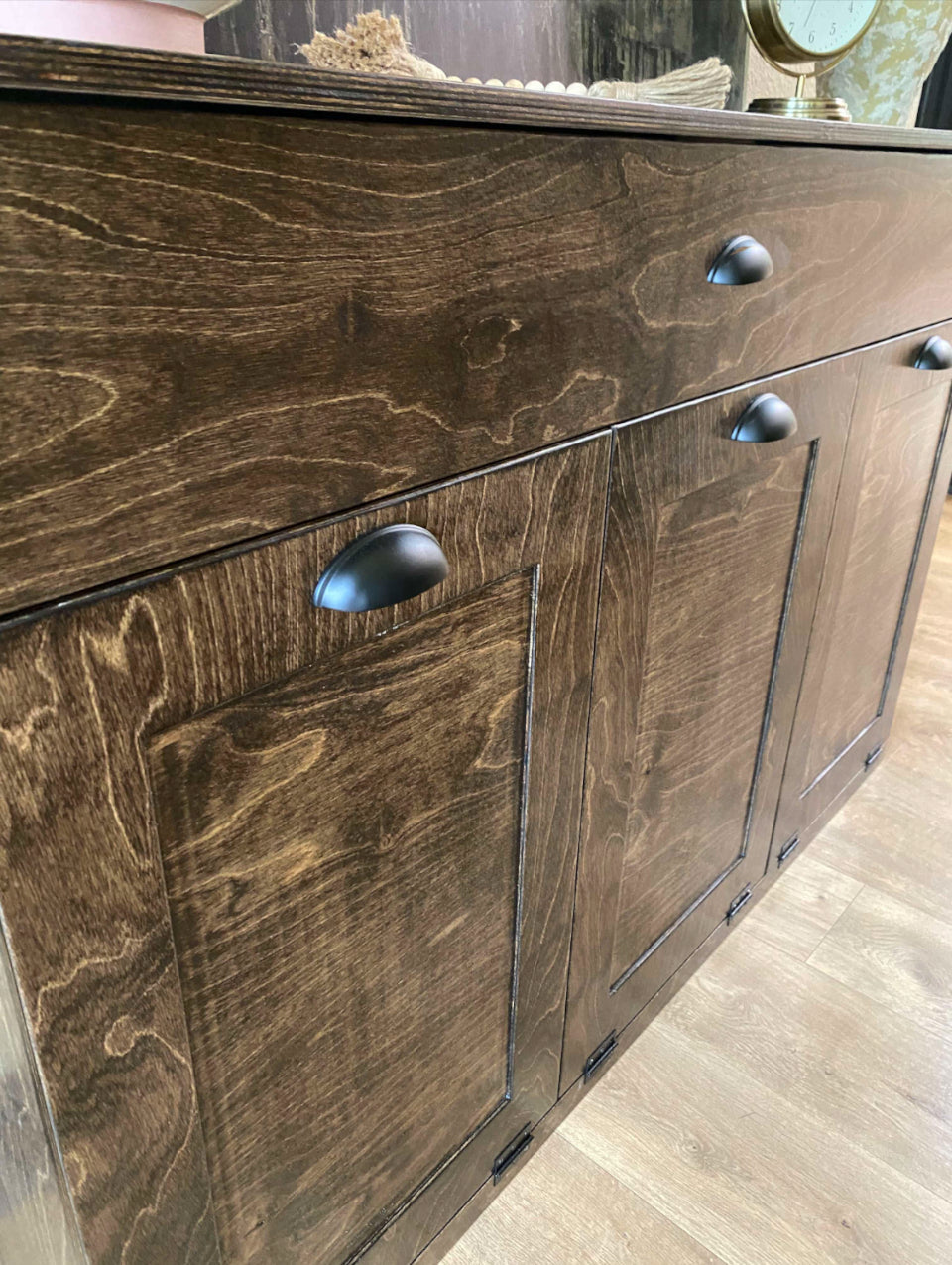 Furniture style laundry with a storage drawer in dark brown stain