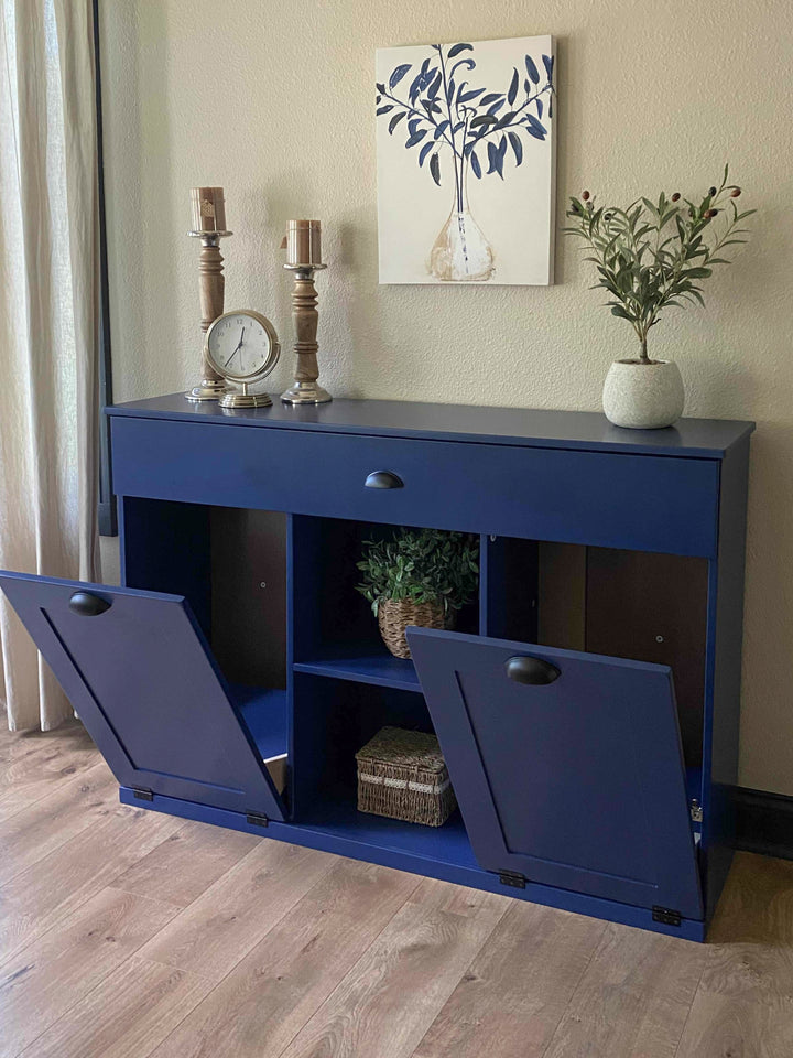 Triple trash cabinet with a storage drawer and open shelving in blue