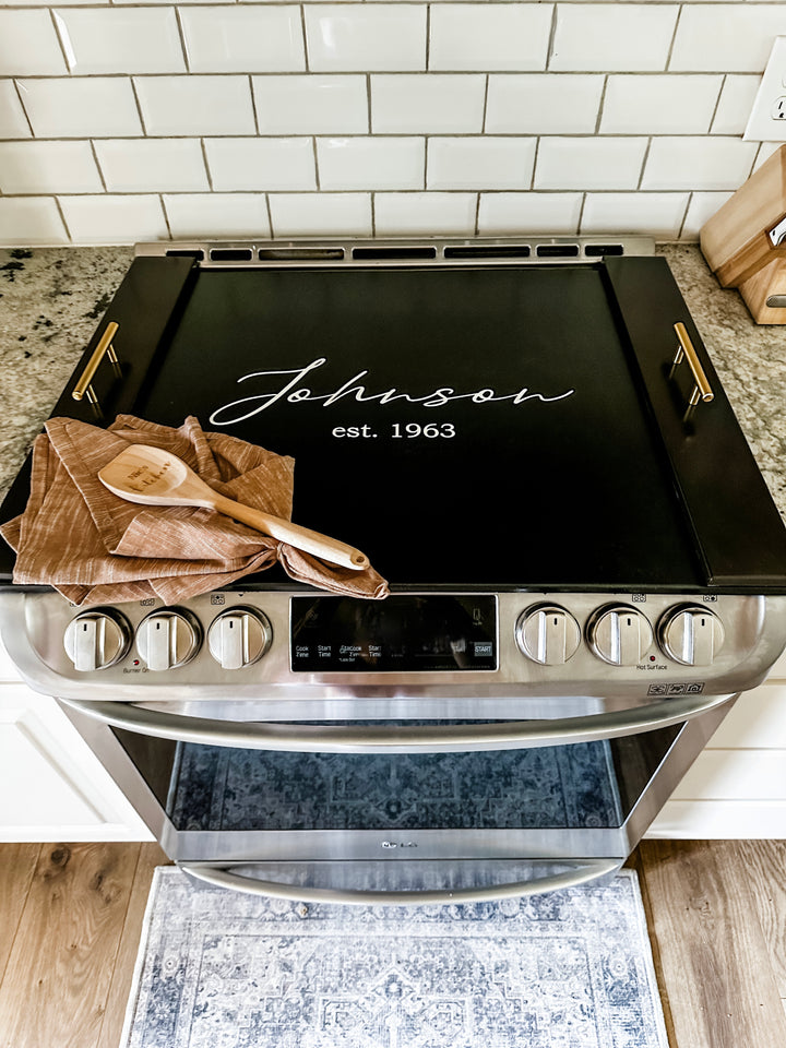 Personalized last name + est. date stove cover, black stain, "Johnson"