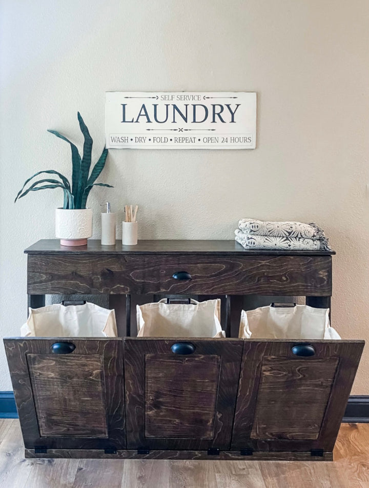 Furniture style laundry with a storage drawer in dark brown stain