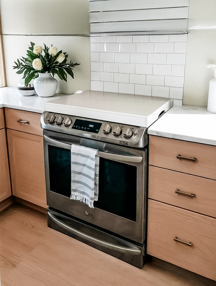 Clean and simple minimalist soft white stove cover
