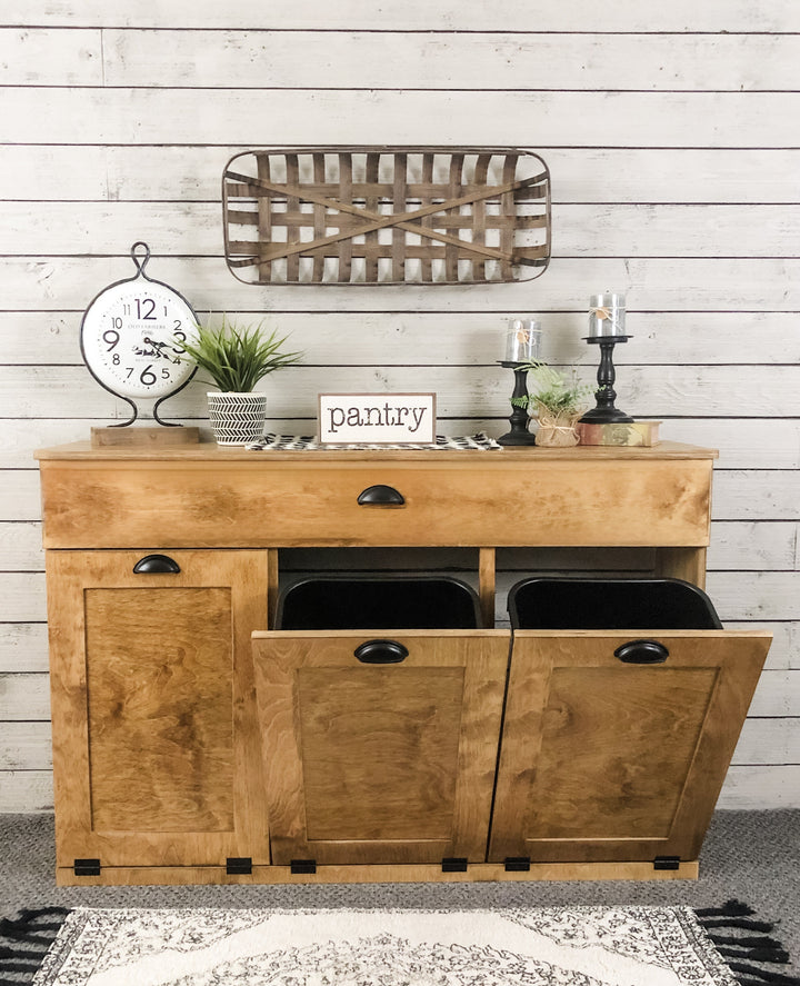 Handmade triple trash cabinet with storage drawer in golden oak stain