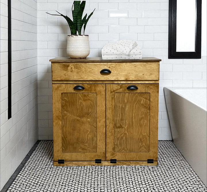 Double laundry with a storage drawer in golden oak counter high