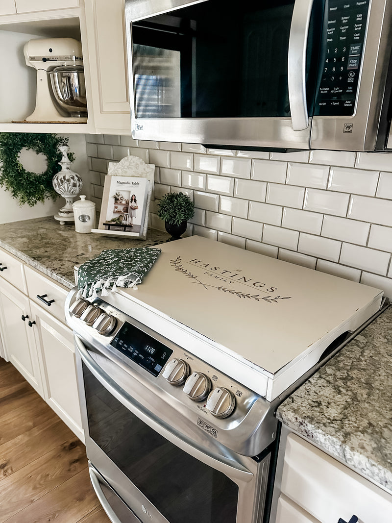 Personalized last name stove cover, ivory distressed, Hastings