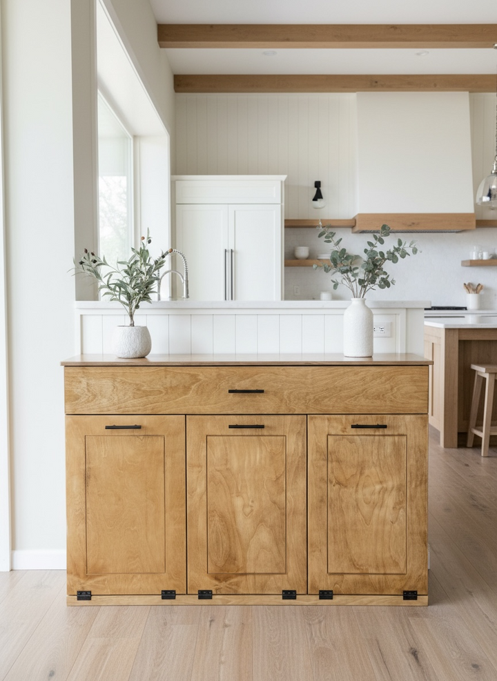 Handmade triple trash cabinet with storage drawer in golden oak stain