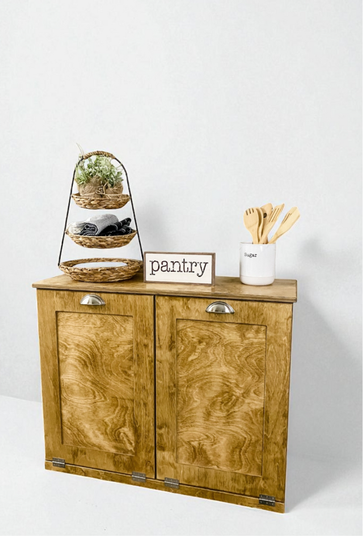 Furniture style double trash cabinet in golden oak